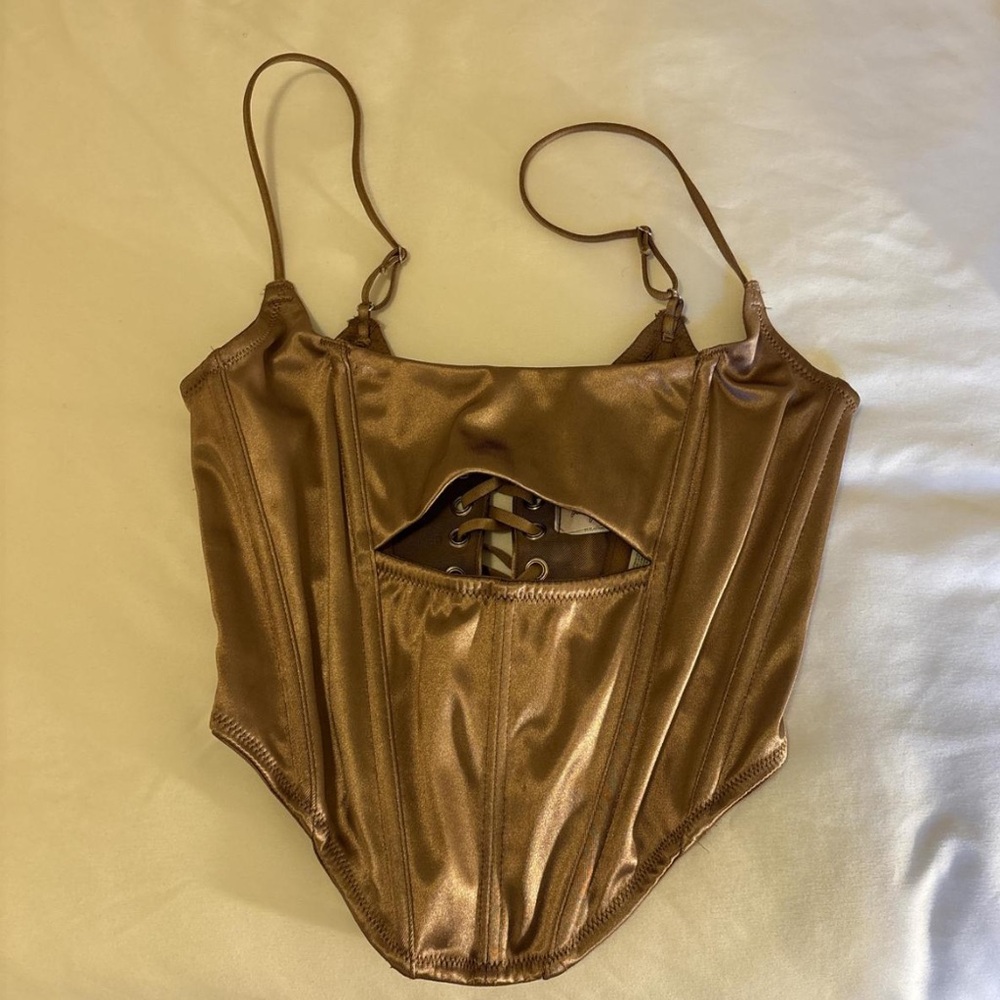 urban outfitters gold metallic cut out corset top